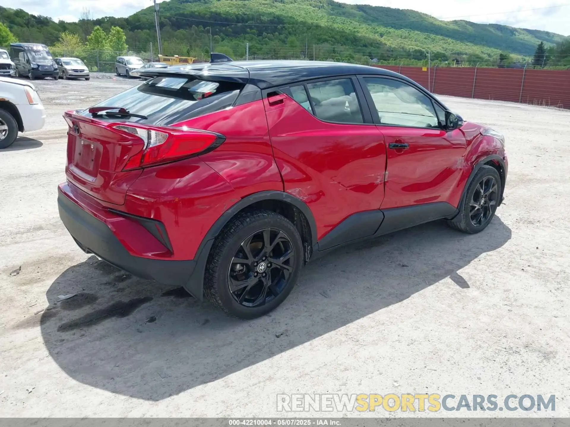 4 Photograph of a damaged car JTNKHMBX5N1129626 TOYOTA C-HR 2022