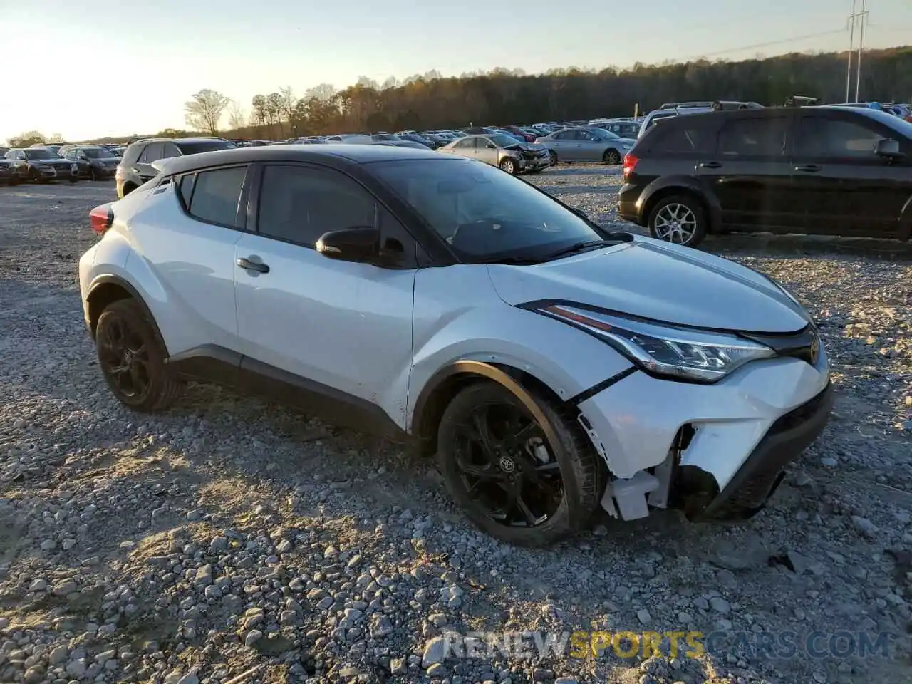 4 Photograph of a damaged car JTNKHMBX5N1129710 TOYOTA C-HR 2022