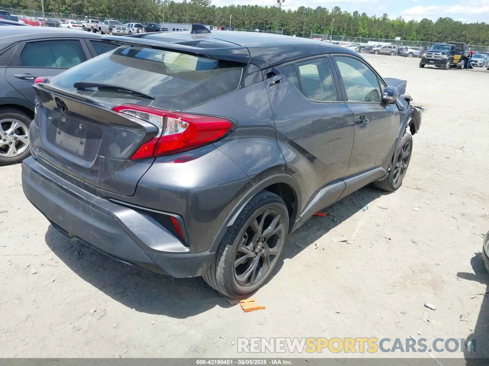 4 Photograph of a damaged car JTNKHMBX6N1135872 TOYOTA C-HR 2022