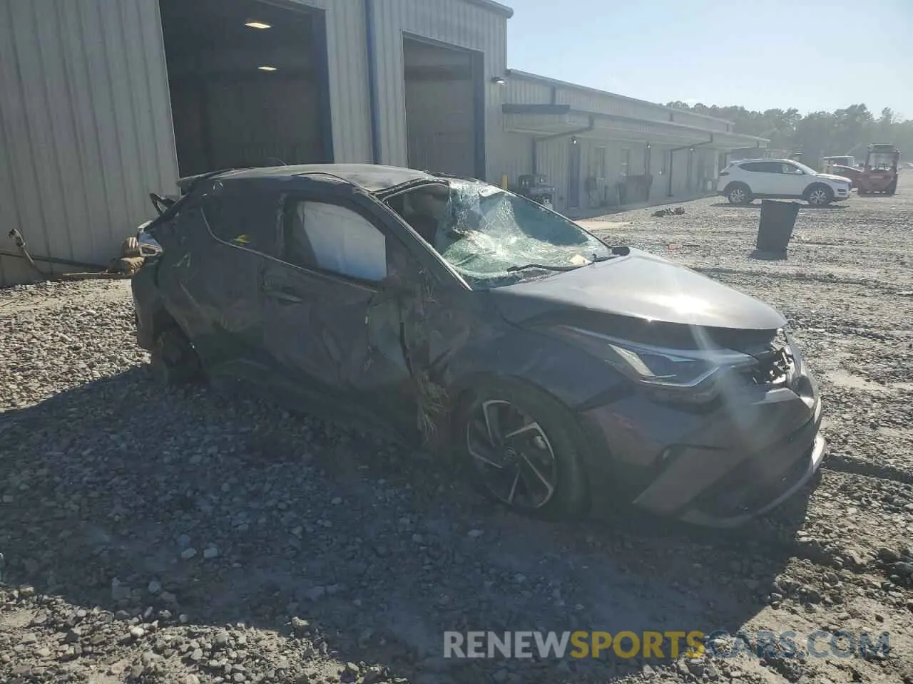 4 Photograph of a damaged car NMTKHMBX7NR143386 TOYOTA C-HR 2022