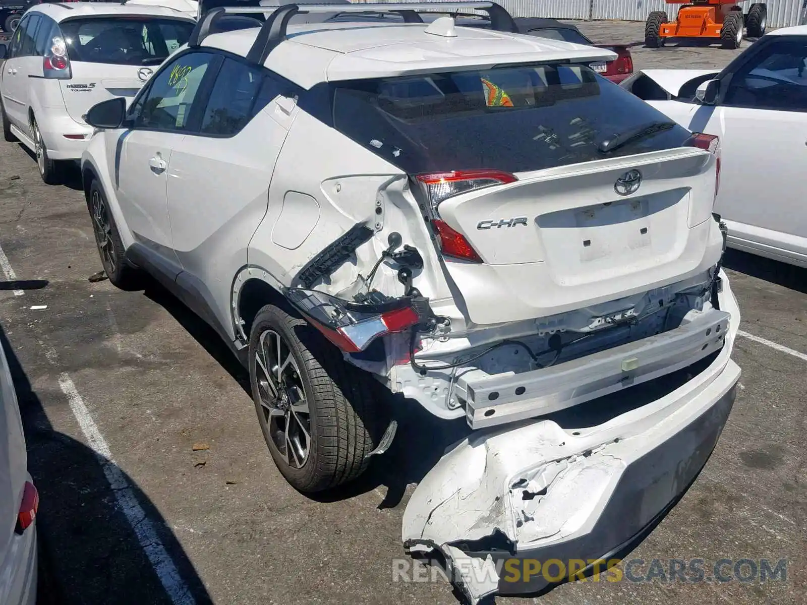 3 Photograph of a damaged car JTNKHMBX4K1038052 TOYOTA C-HR XLE 2019