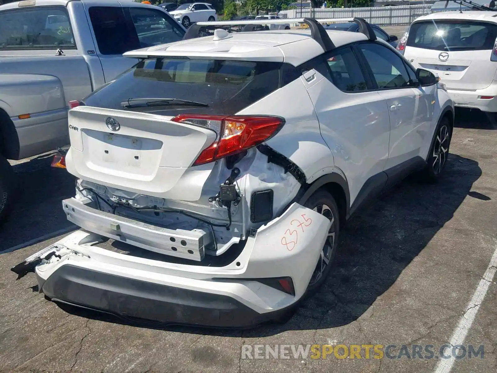 4 Photograph of a damaged car JTNKHMBX4K1038052 TOYOTA C-HR XLE 2019