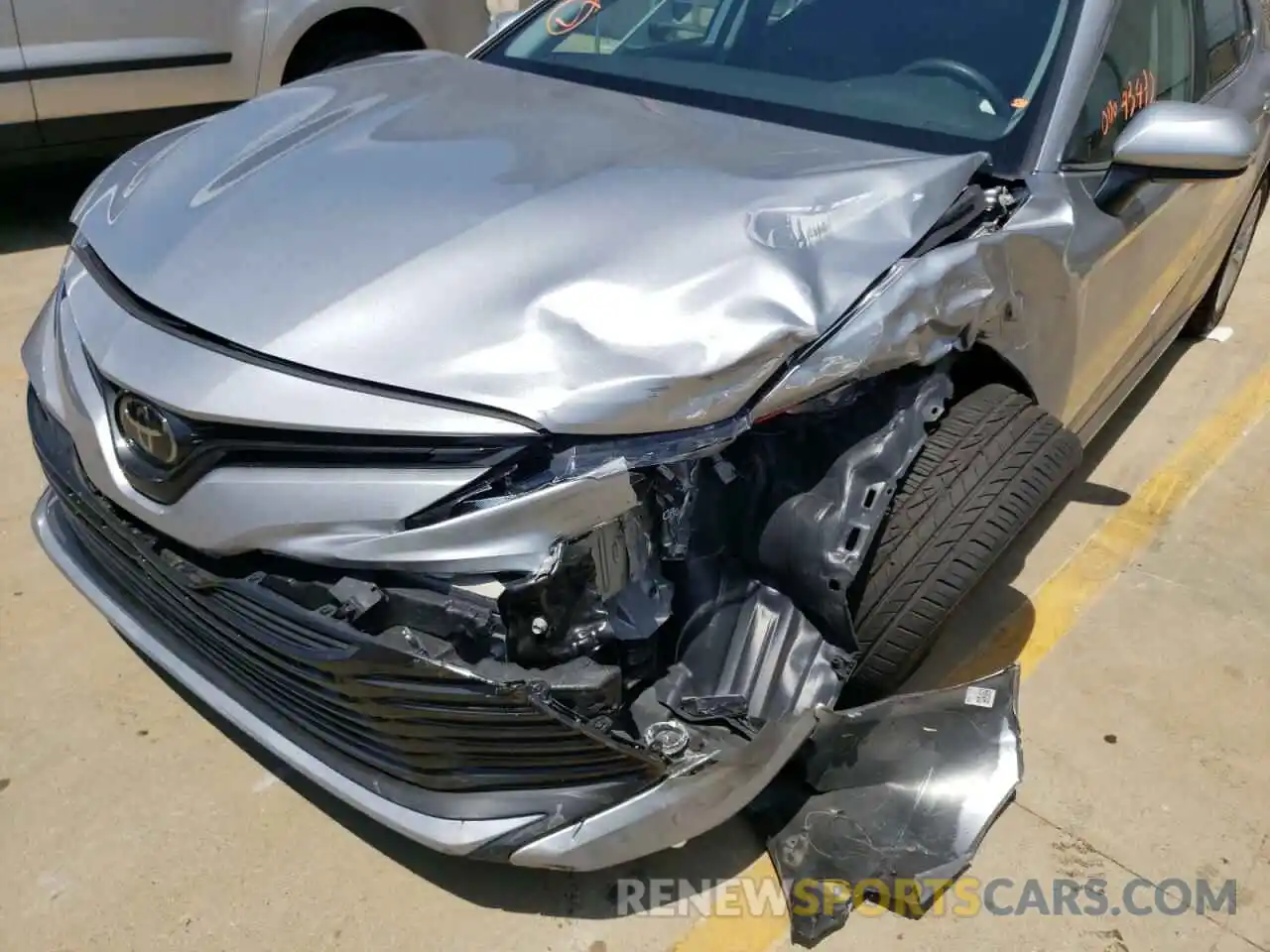 9 Photograph of a damaged car 4T1B11HK0KU165569 TOYOTA CAMRY 2019