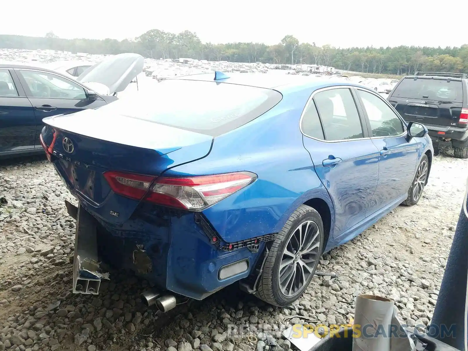 4 Photograph of a damaged car 4T1B11HK0KU166561 TOYOTA CAMRY 2019