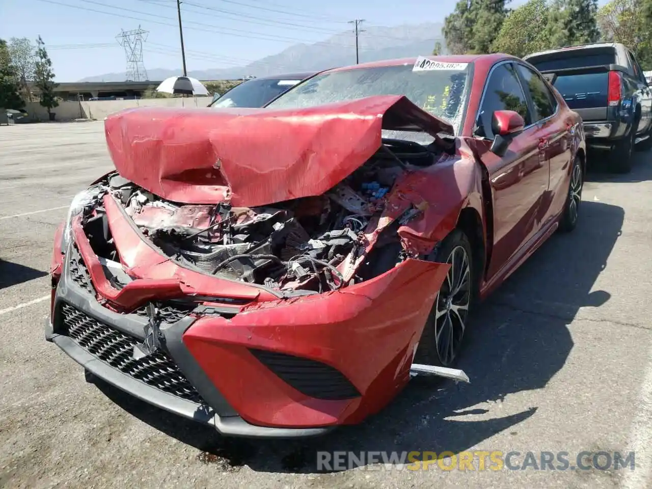 2 Photograph of a damaged car 4T1B11HK0KU171260 TOYOTA CAMRY 2019