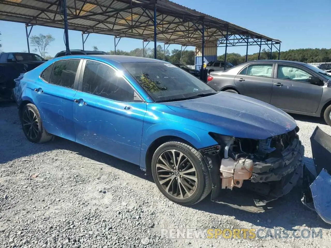4 Photograph of a damaged car 4T1B11HK0KU179374 TOYOTA CAMRY 2019