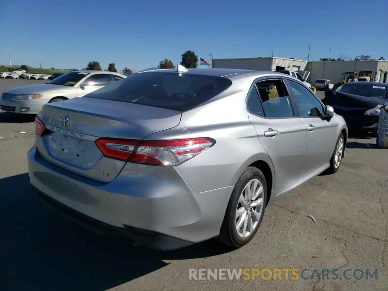 4 Photograph of a damaged car 4T1B11HK0KU180489 TOYOTA CAMRY 2019