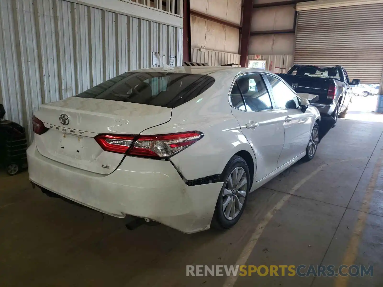 4 Photograph of a damaged car 4T1B11HK0KU183358 TOYOTA CAMRY 2019