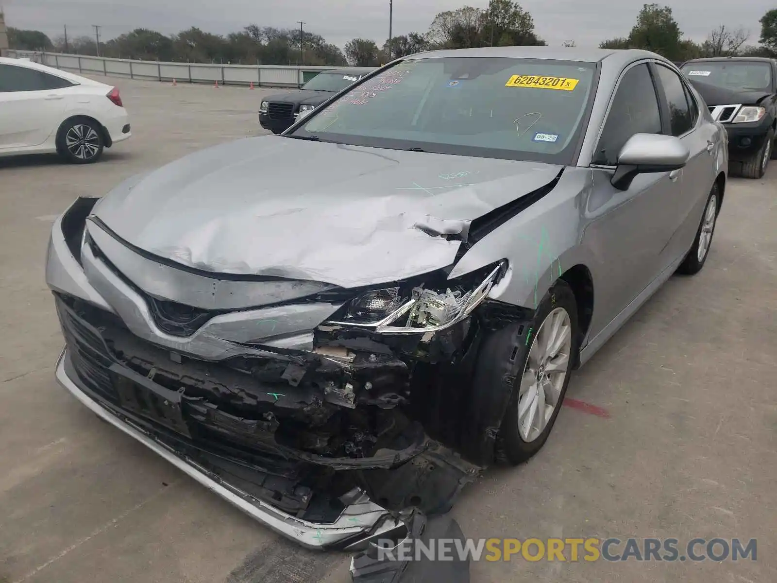 2 Photograph of a damaged car 4T1B11HK0KU184591 TOYOTA CAMRY 2019