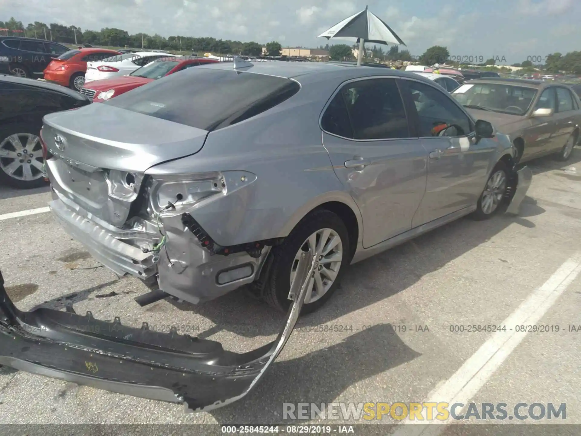 4 Photograph of a damaged car 4T1B11HK0KU189676 TOYOTA CAMRY 2019