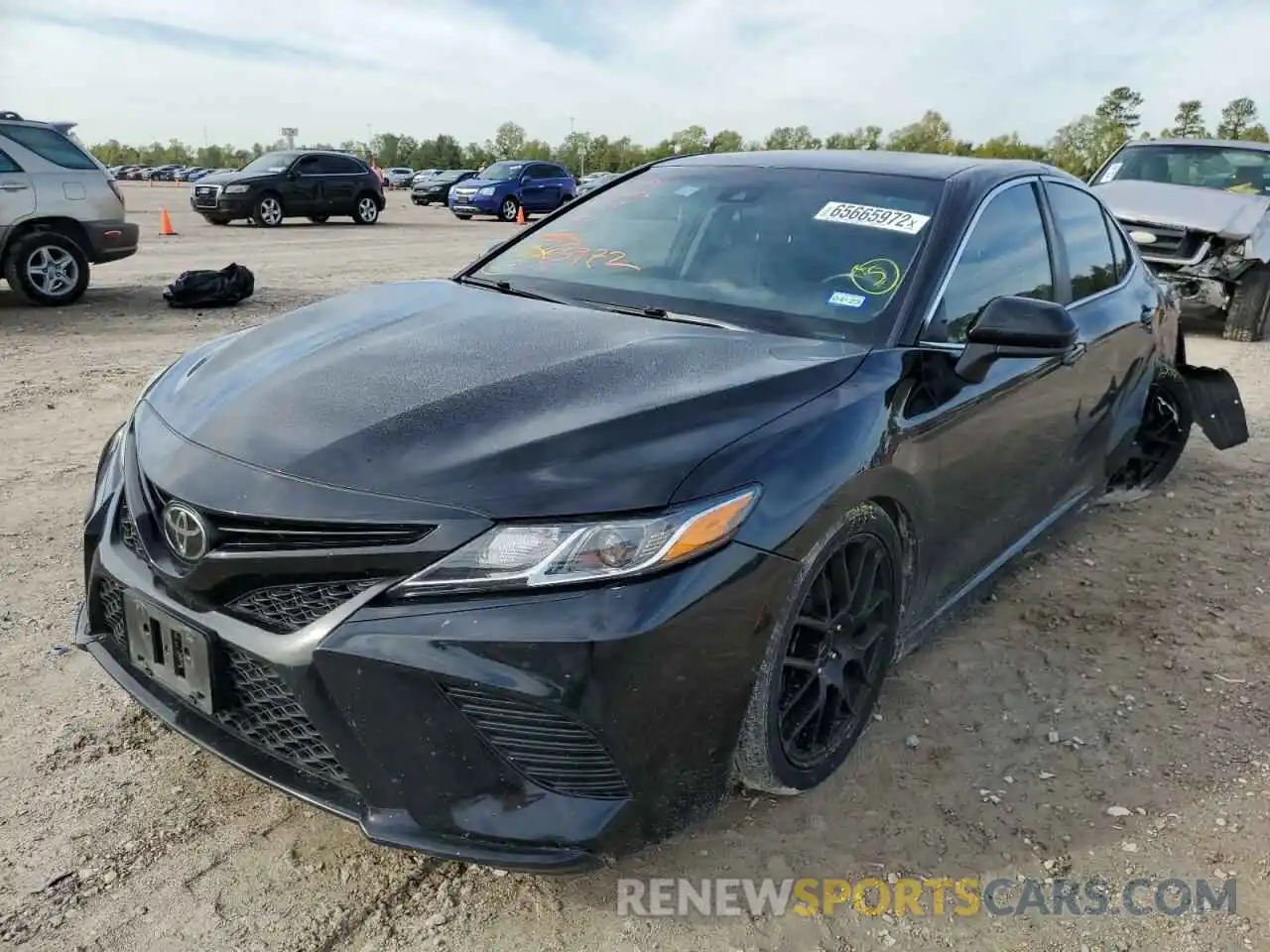 2 Photograph of a damaged car 4T1B11HK0KU192139 TOYOTA CAMRY 2019