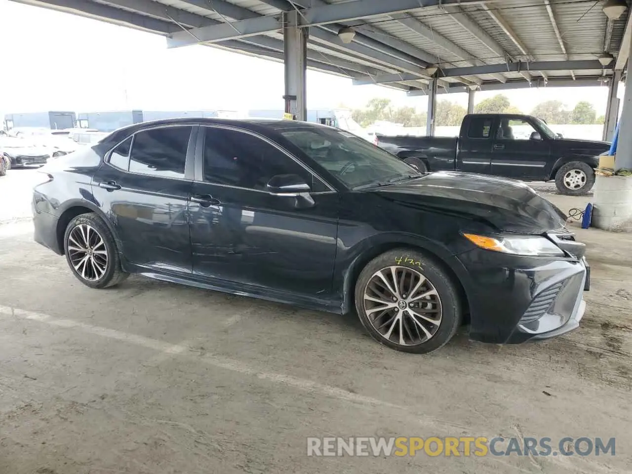 4 Photograph of a damaged car 4T1B11HK0KU199902 TOYOTA CAMRY 2019