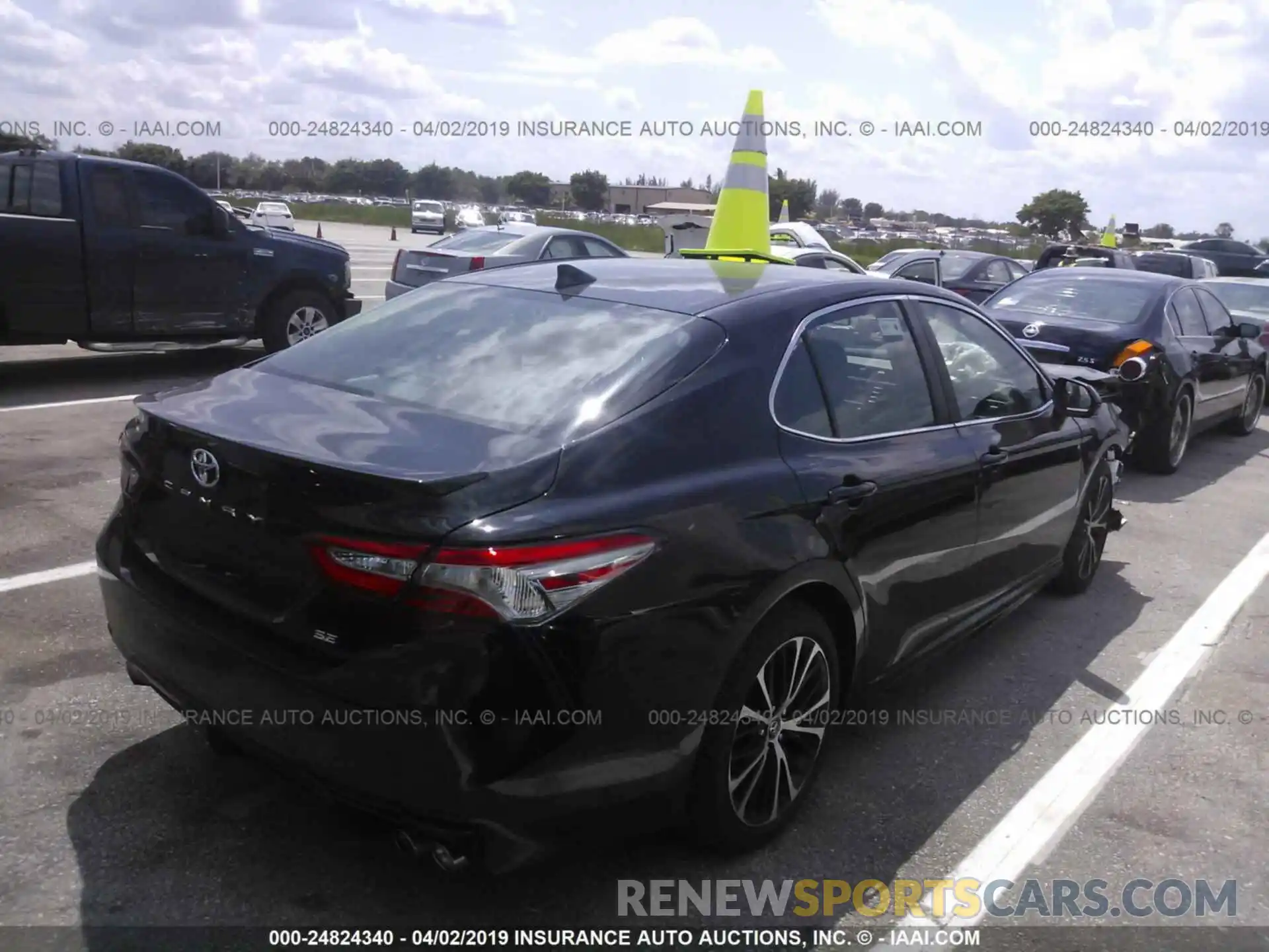 4 Photograph of a damaged car 4T1B11HK0KU207707 TOYOTA CAMRY 2019