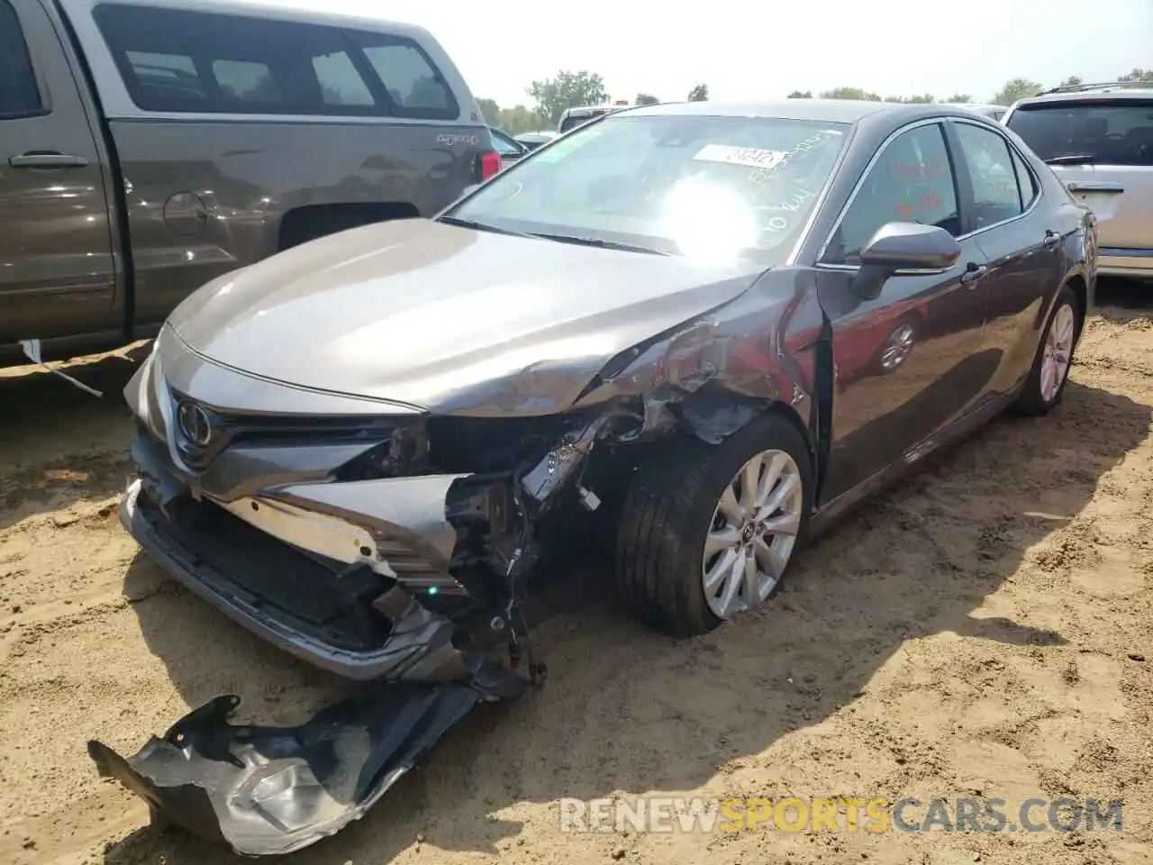 2 Photograph of a damaged car 4T1B11HK0KU207738 TOYOTA CAMRY 2019