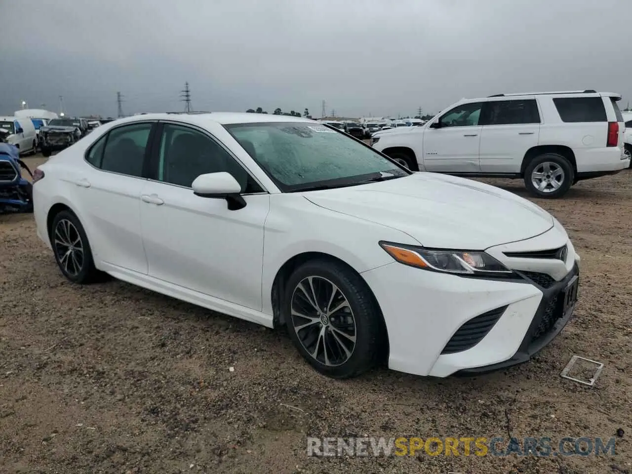 4 Photograph of a damaged car 4T1B11HK0KU210543 TOYOTA CAMRY 2019