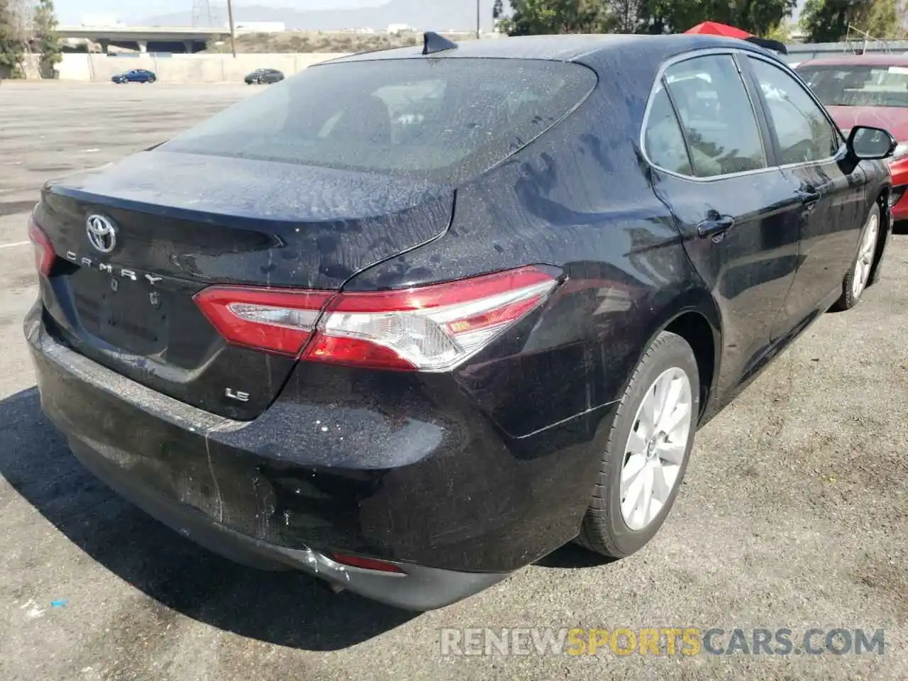 4 Photograph of a damaged car 4T1B11HK0KU212373 TOYOTA CAMRY 2019