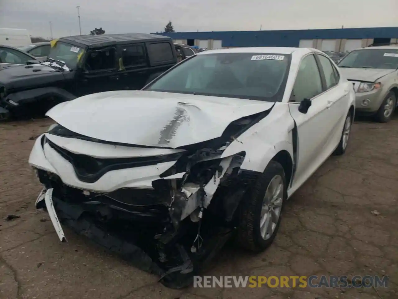 2 Photograph of a damaged car 4T1B11HK0KU217539 TOYOTA CAMRY 2019