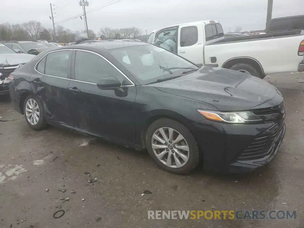 4 Photograph of a damaged car 4T1B11HK0KU218237 TOYOTA CAMRY 2019