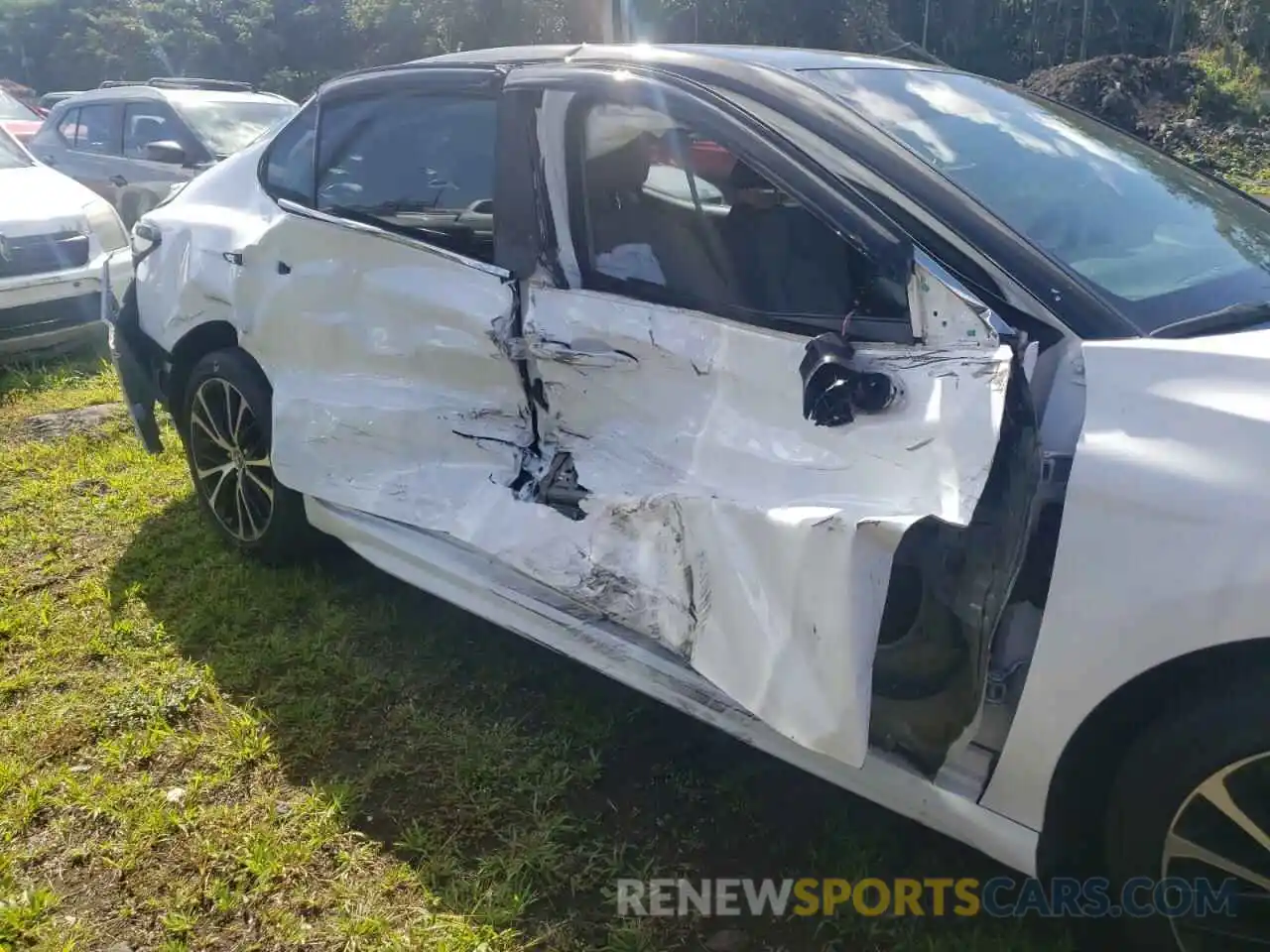 9 Photograph of a damaged car 4T1B11HK0KU218805 TOYOTA CAMRY 2019