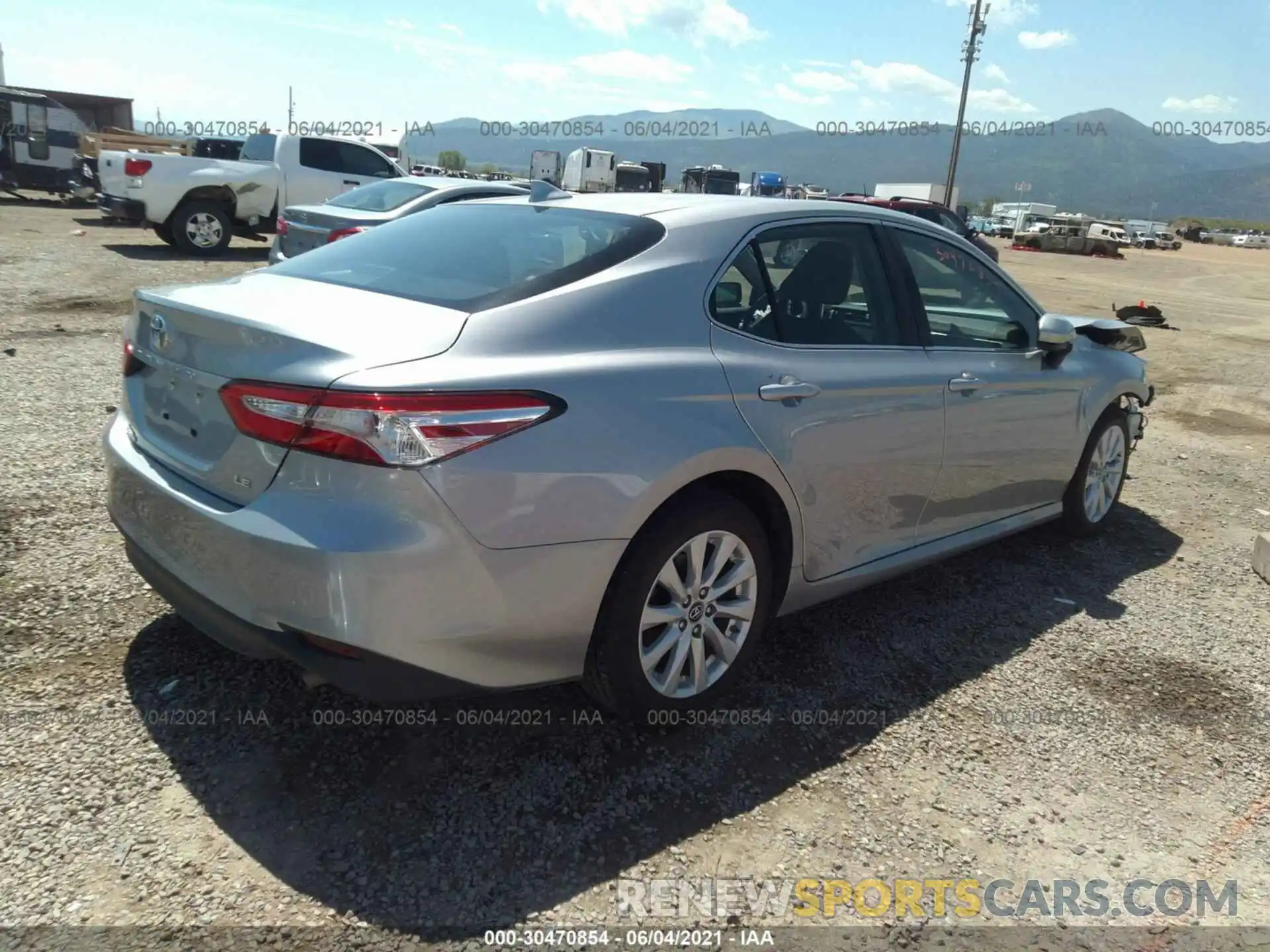 4 Photograph of a damaged car 4T1B11HK0KU220179 TOYOTA CAMRY 2019