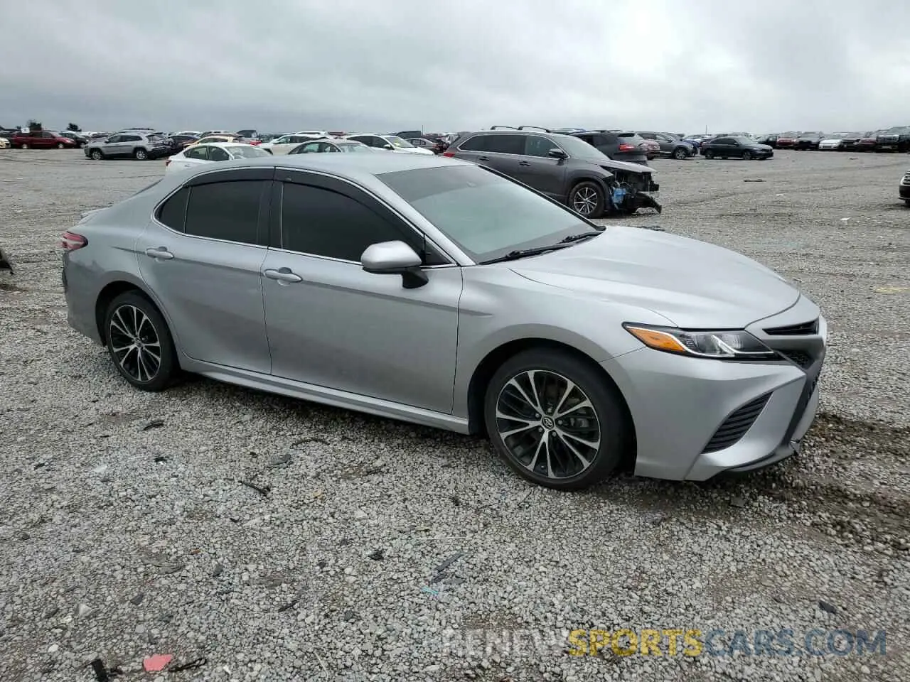 4 Photograph of a damaged car 4T1B11HK0KU220876 TOYOTA CAMRY 2019