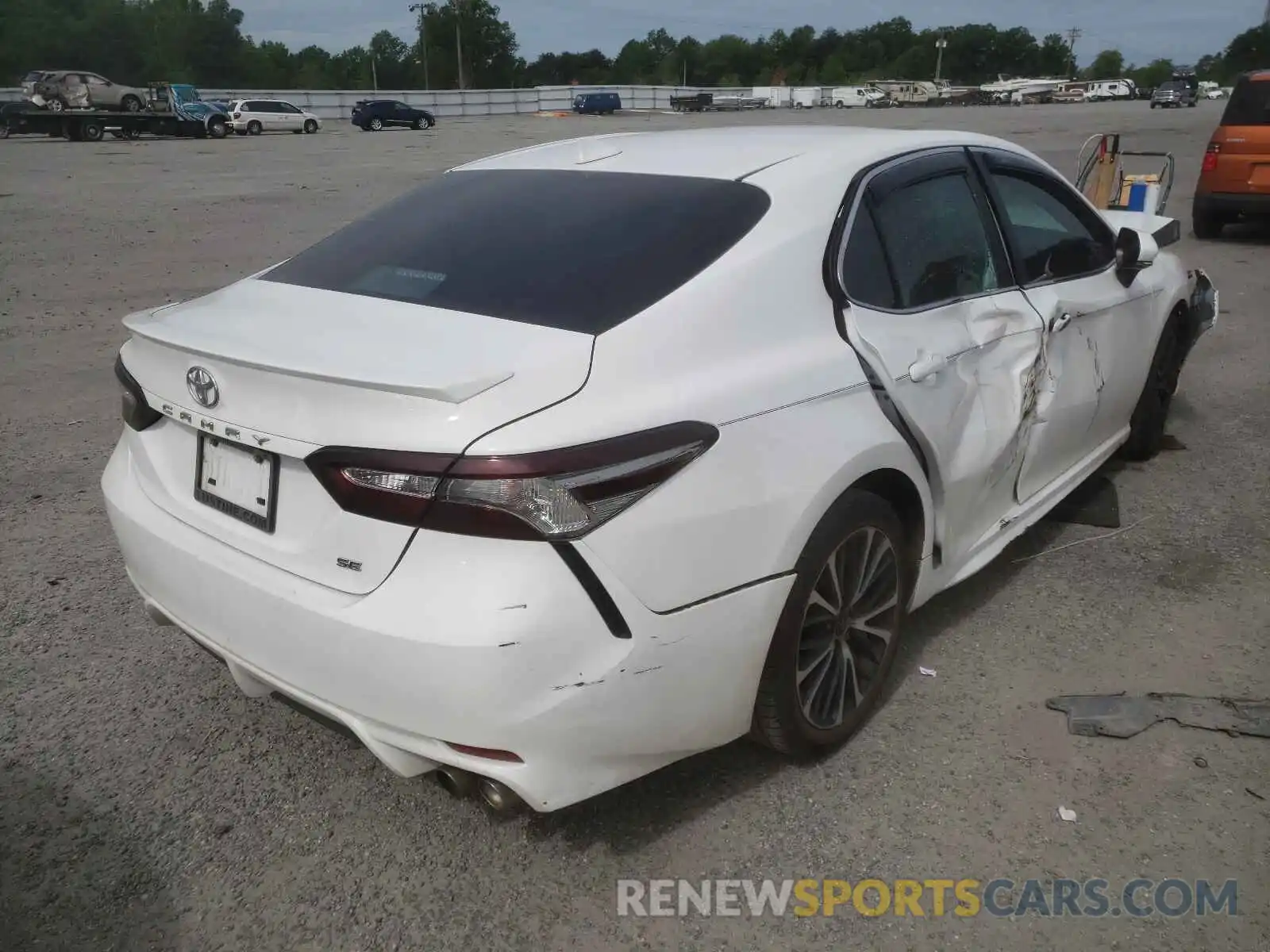 4 Photograph of a damaged car 4T1B11HK0KU227875 TOYOTA CAMRY 2019