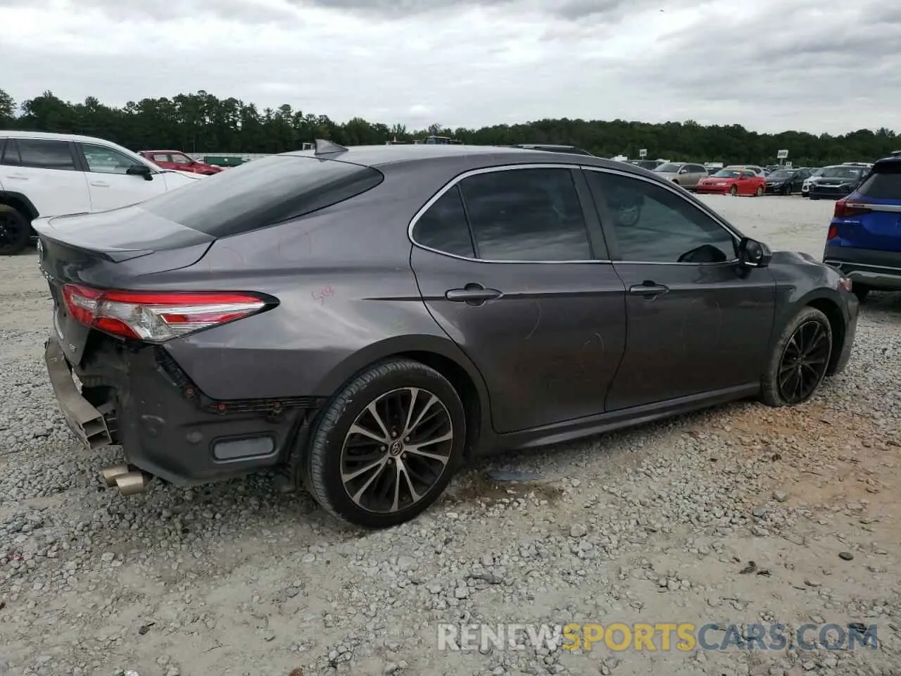 3 Photograph of a damaged car 4T1B11HK0KU230839 TOYOTA CAMRY 2019
