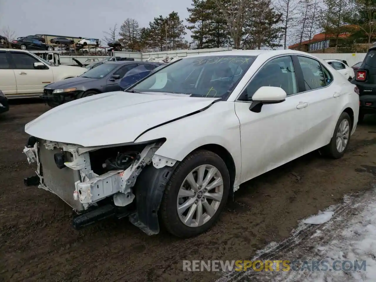 2 Photograph of a damaged car 4T1B11HK0KU240786 TOYOTA CAMRY 2019