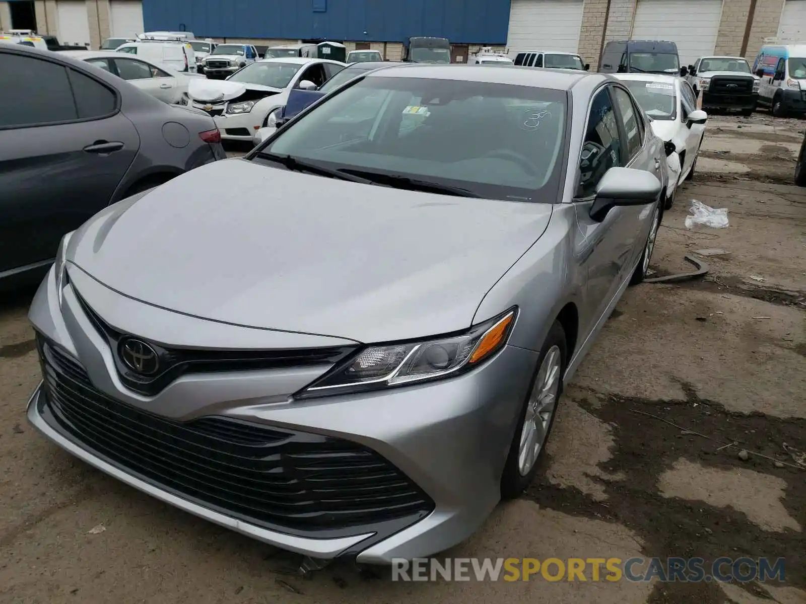 2 Photograph of a damaged car 4T1B11HK0KU241212 TOYOTA CAMRY 2019