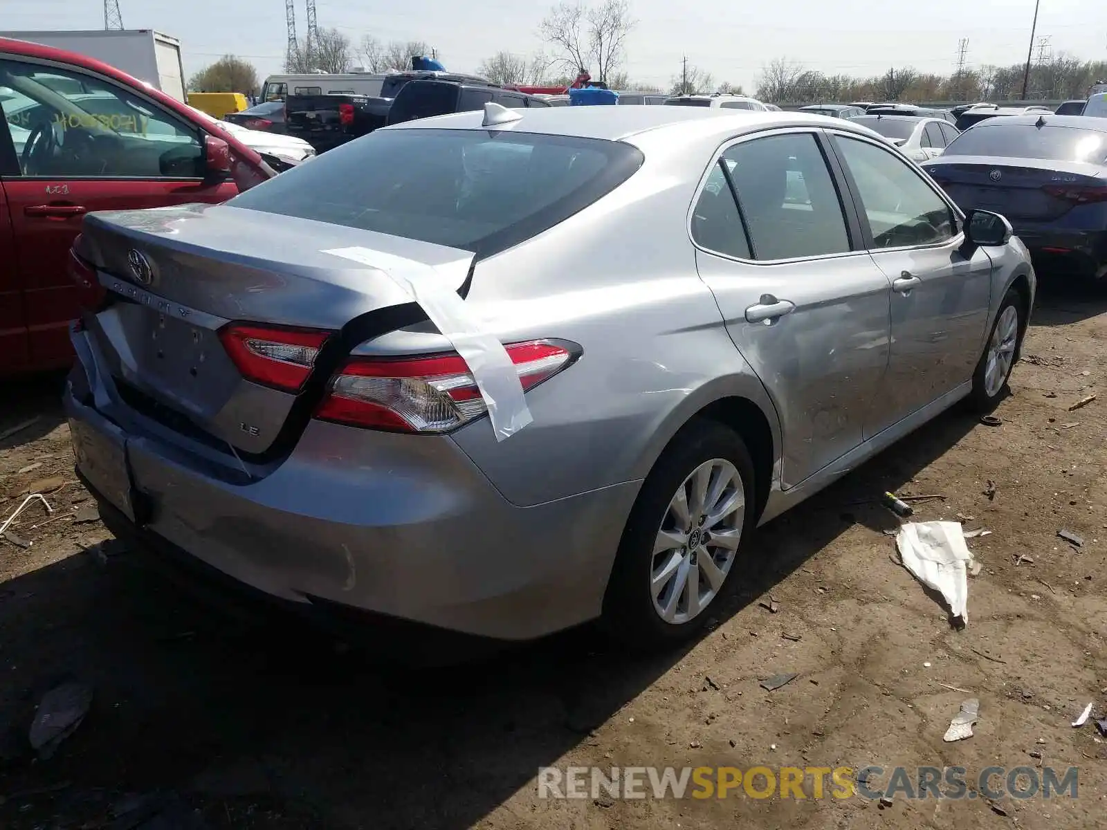 4 Photograph of a damaged car 4T1B11HK0KU241212 TOYOTA CAMRY 2019