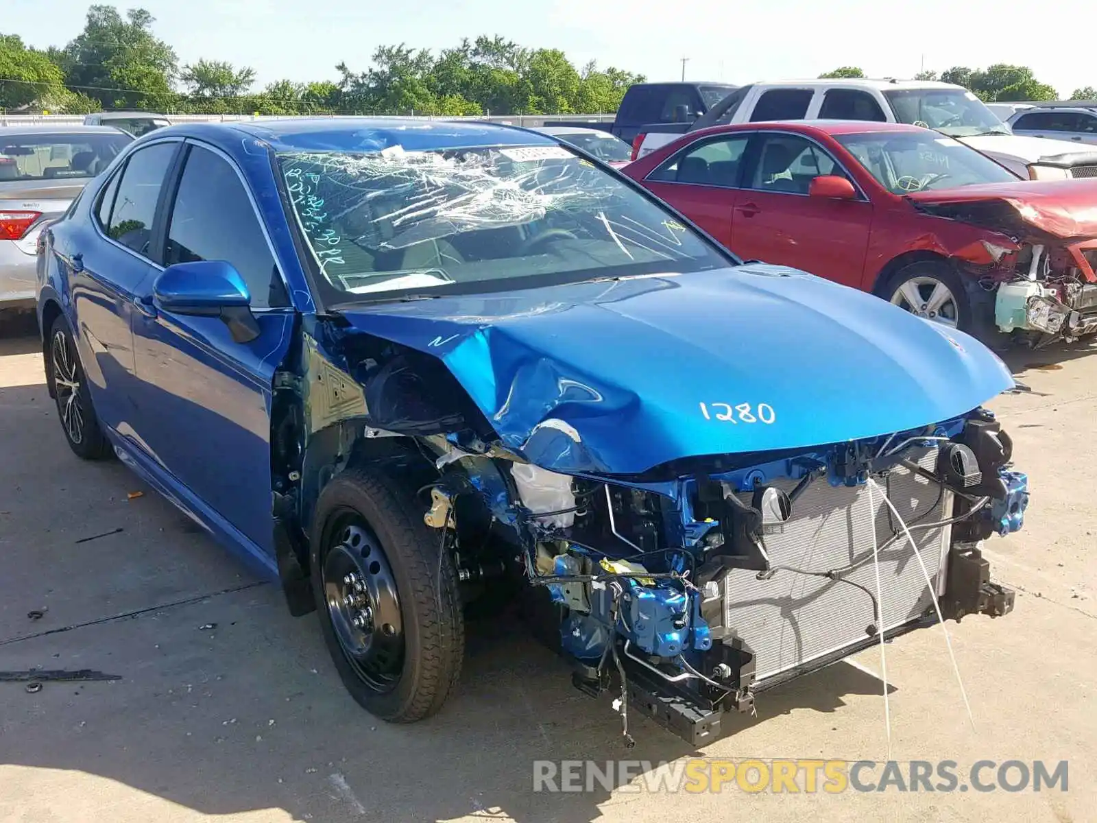 1 Photograph of a damaged car 4T1B11HK0KU242621 TOYOTA CAMRY 2019