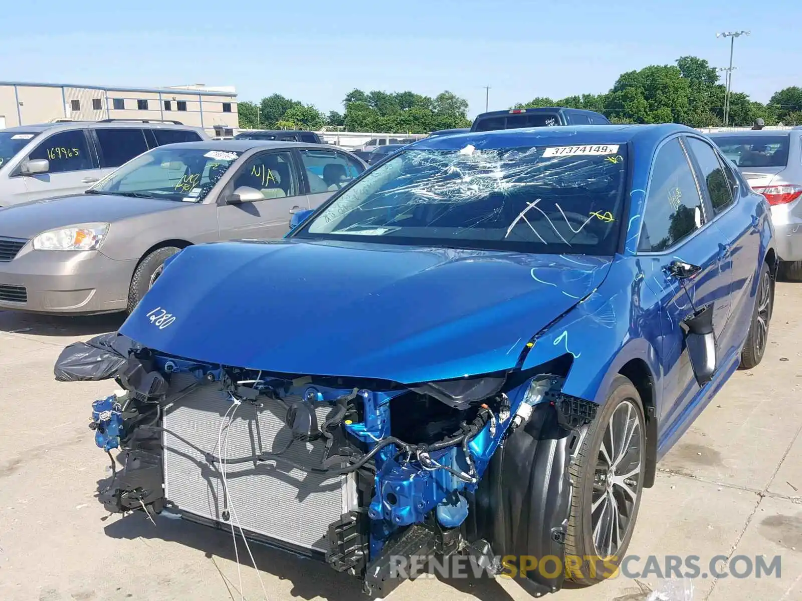 2 Photograph of a damaged car 4T1B11HK0KU242621 TOYOTA CAMRY 2019