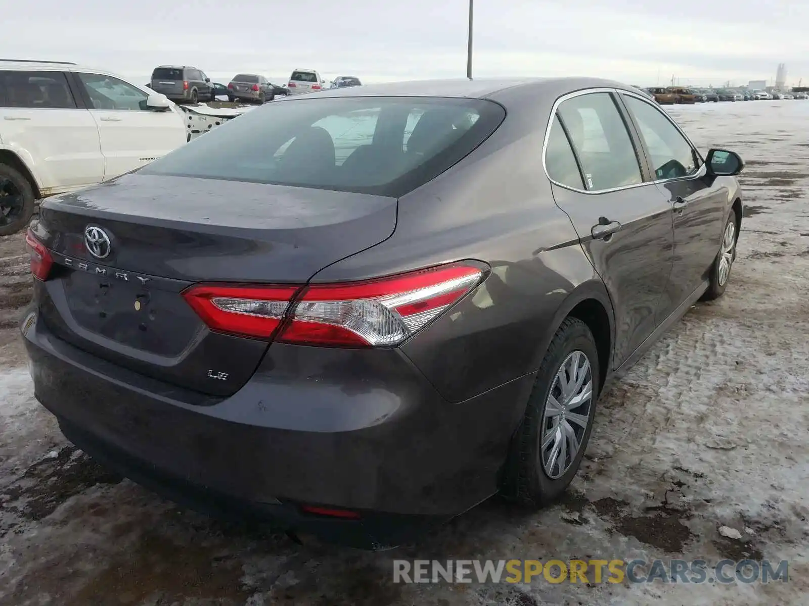 4 Photograph of a damaged car 4T1B11HK0KU246488 TOYOTA CAMRY 2019