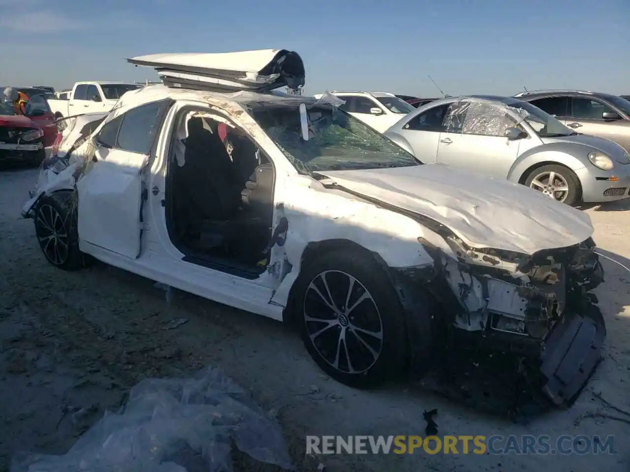 4 Photograph of a damaged car 4T1B11HK0KU250752 TOYOTA CAMRY 2019