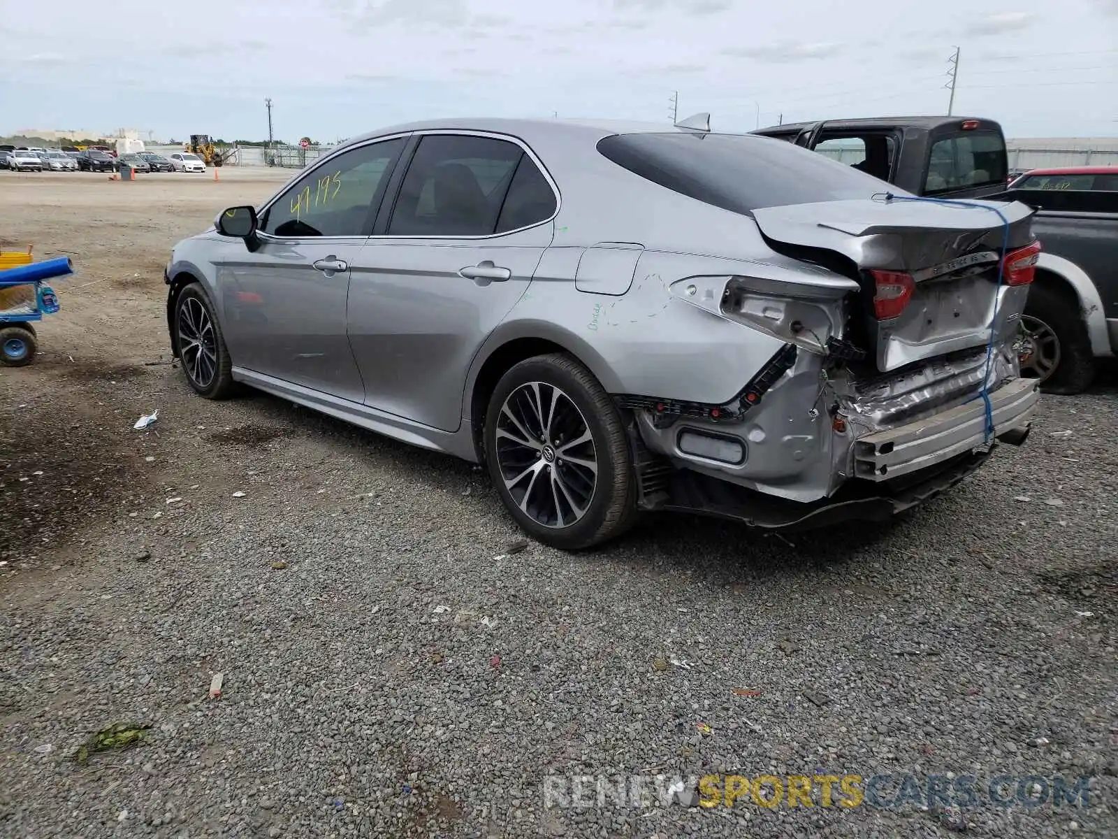 3 Photograph of a damaged car 4T1B11HK0KU251819 TOYOTA CAMRY 2019