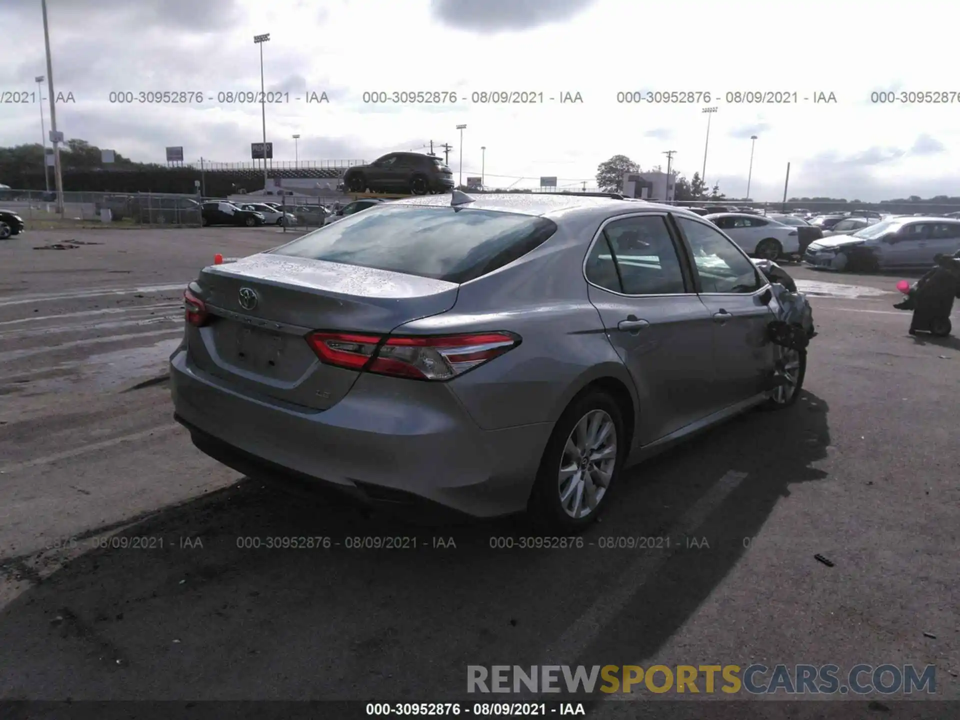 4 Photograph of a damaged car 4T1B11HK0KU252565 TOYOTA CAMRY 2019