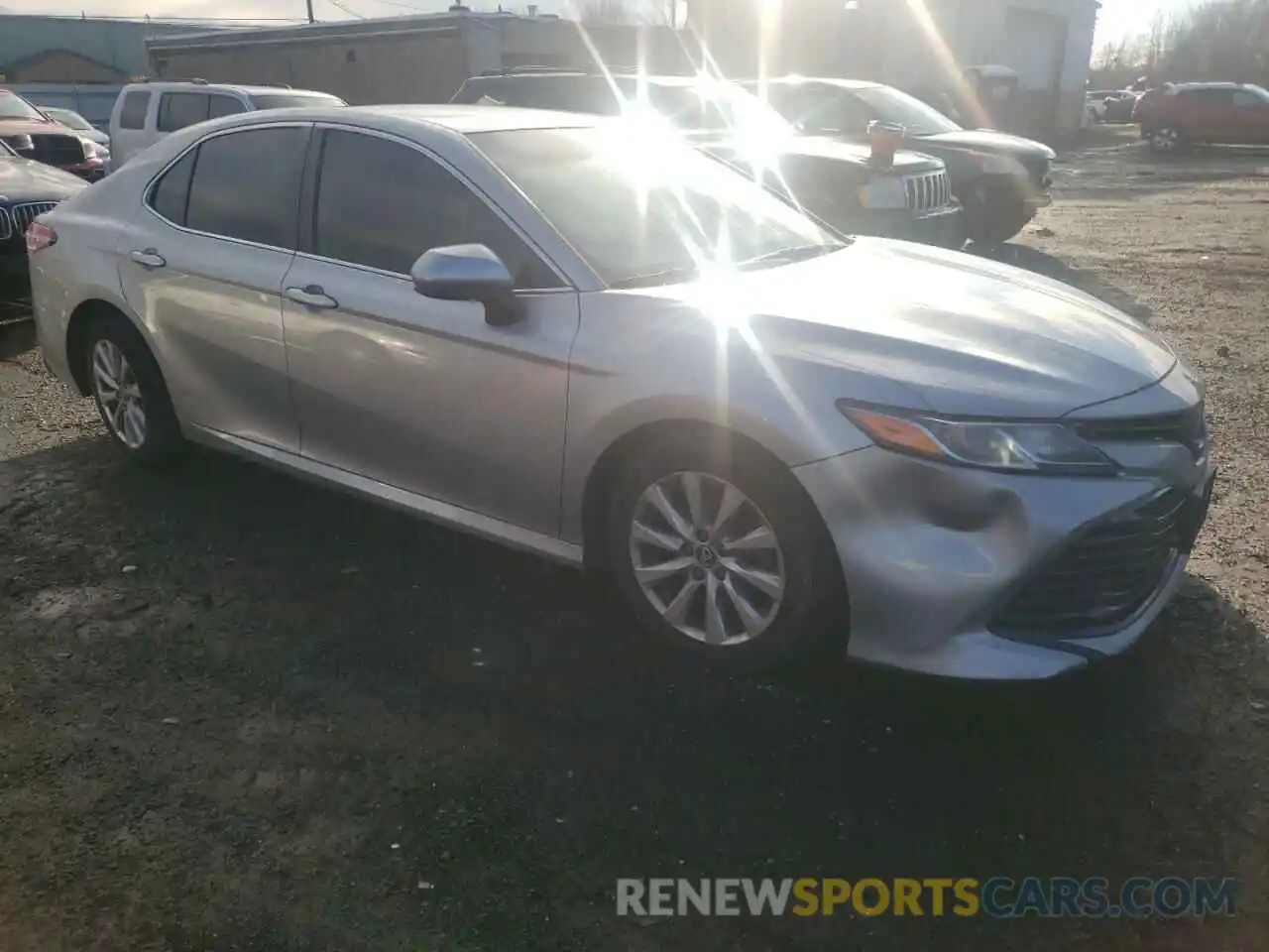 4 Photograph of a damaged car 4T1B11HK0KU253893 TOYOTA CAMRY 2019