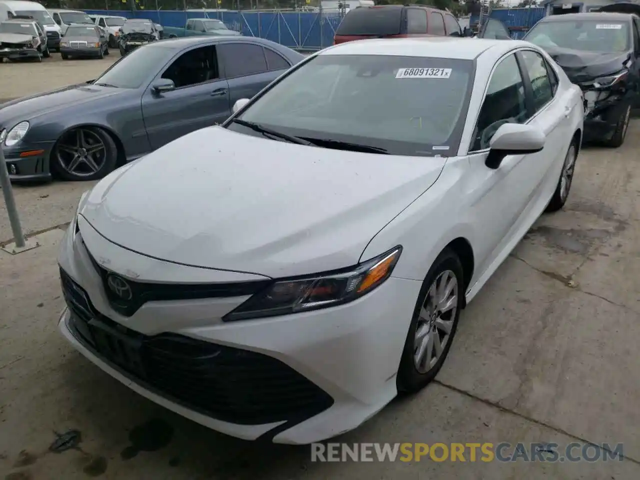 2 Photograph of a damaged car 4T1B11HK0KU255885 TOYOTA CAMRY 2019