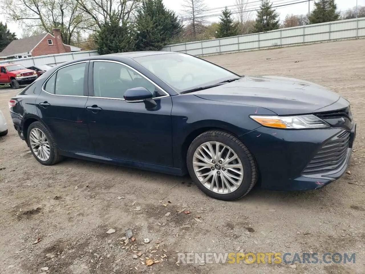 4 Photograph of a damaged car 4T1B11HK0KU256311 TOYOTA CAMRY 2019