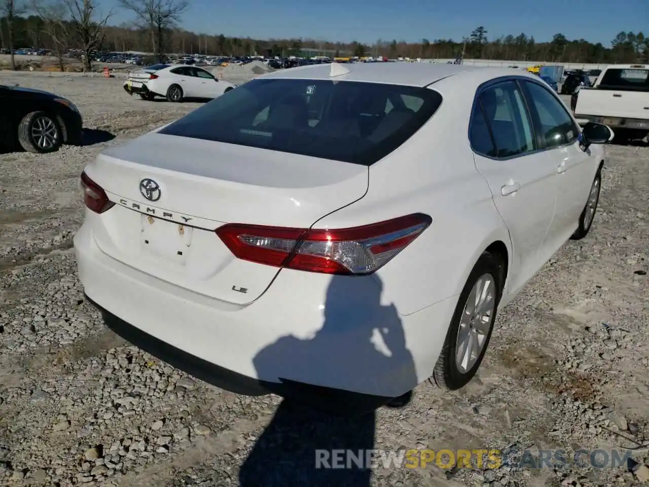 4 Photograph of a damaged car 4T1B11HK0KU257216 TOYOTA CAMRY 2019