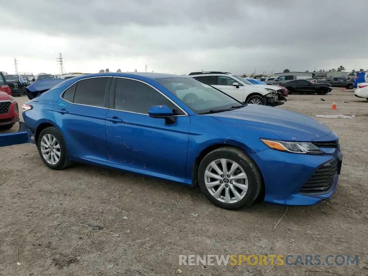 4 Photograph of a damaged car 4T1B11HK0KU263680 TOYOTA CAMRY 2019