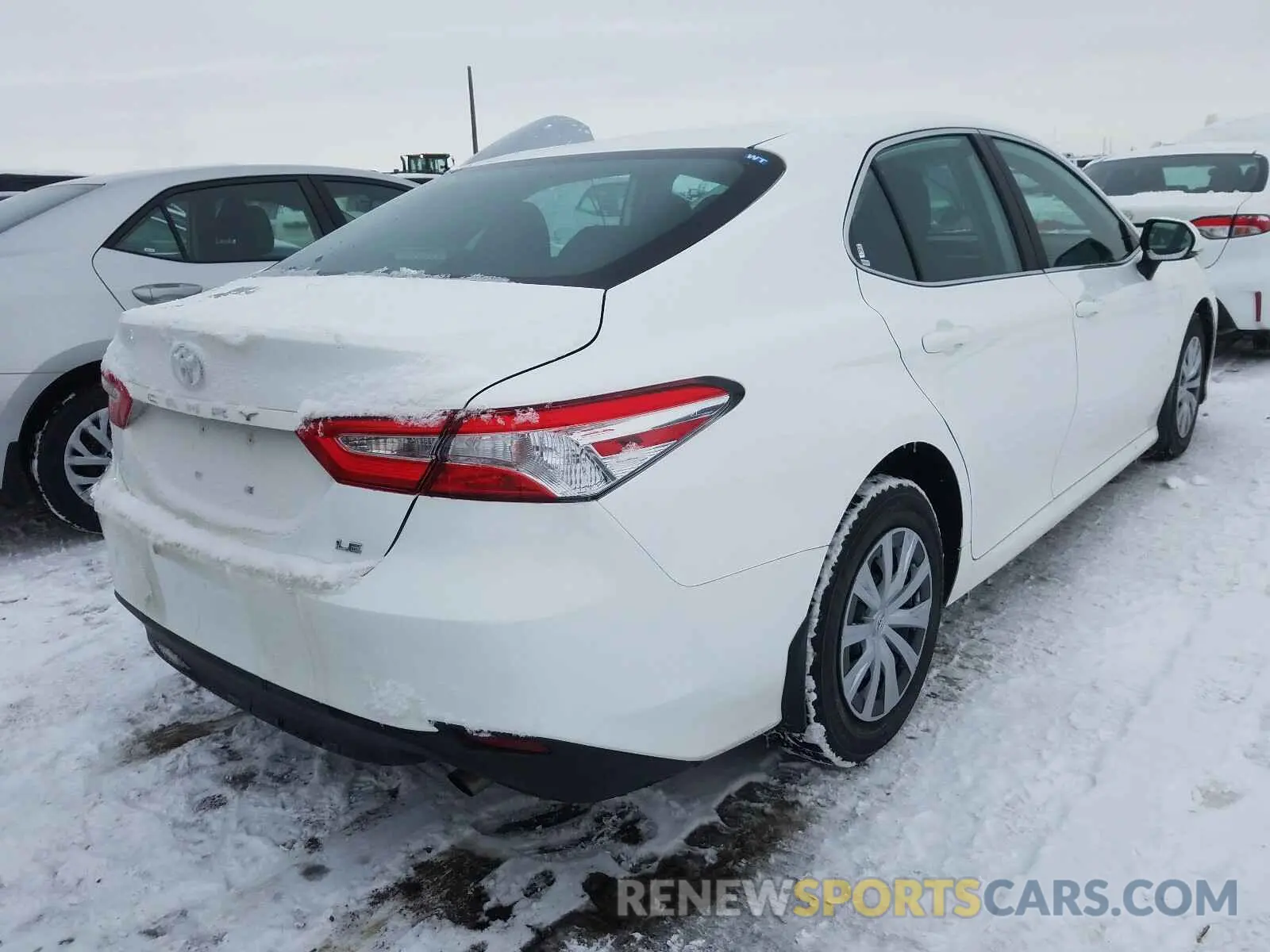 4 Photograph of a damaged car 4T1B11HK0KU265252 TOYOTA CAMRY 2019