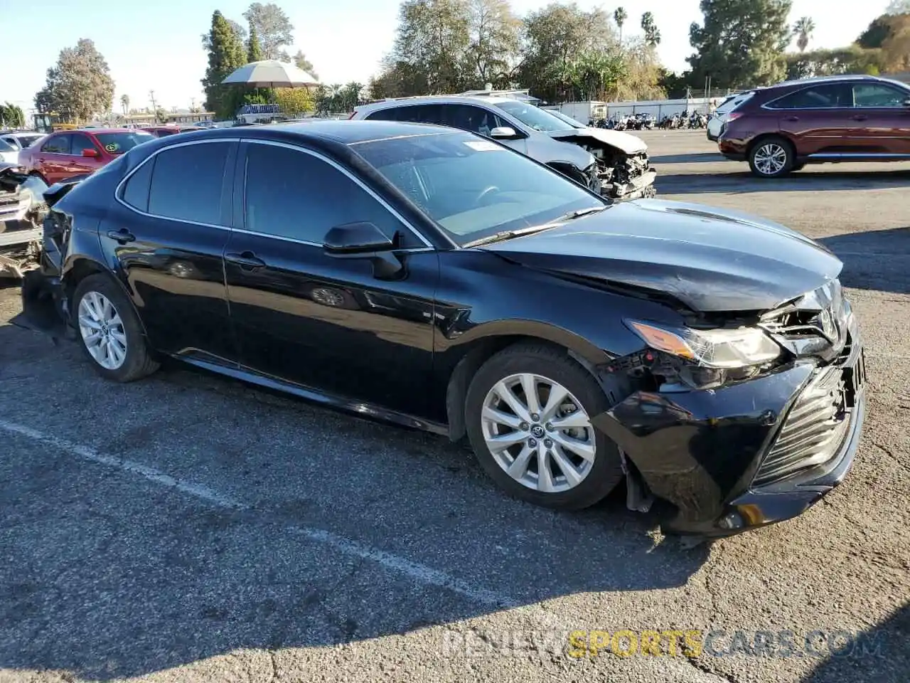 4 Photograph of a damaged car 4T1B11HK0KU270760 TOYOTA CAMRY 2019