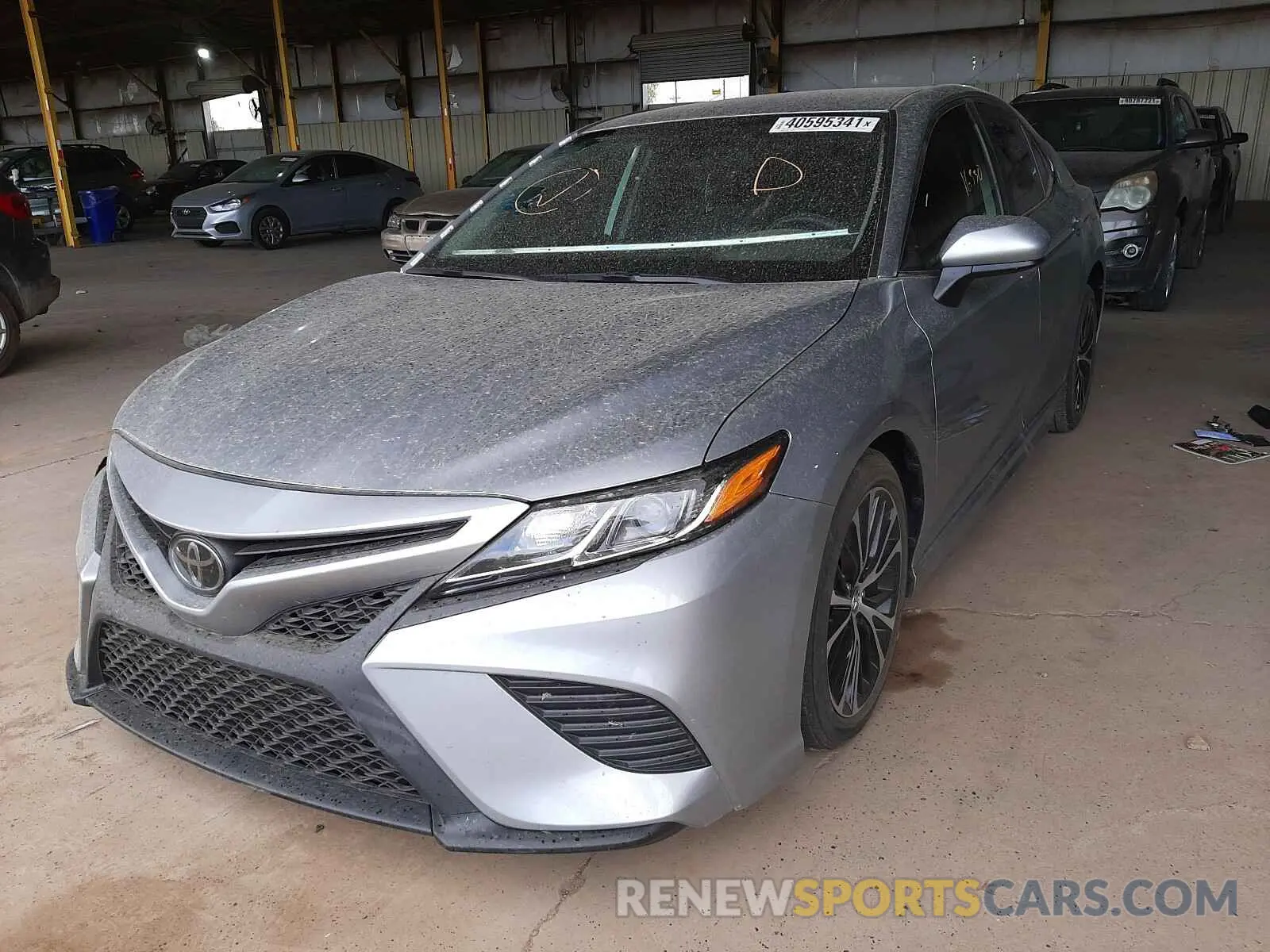 2 Photograph of a damaged car 4T1B11HK0KU274243 TOYOTA CAMRY 2019