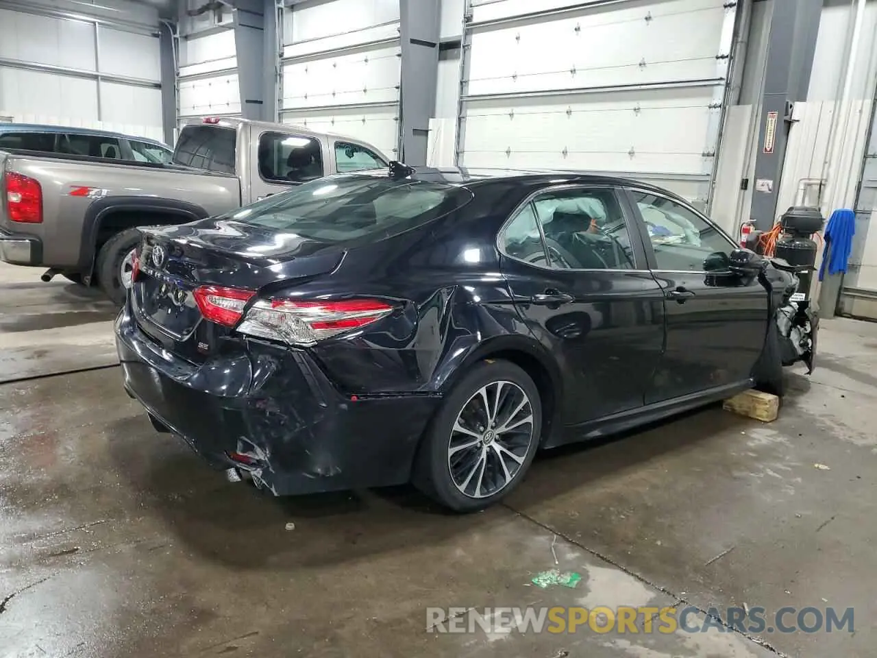 3 Photograph of a damaged car 4T1B11HK0KU275392 TOYOTA CAMRY 2019