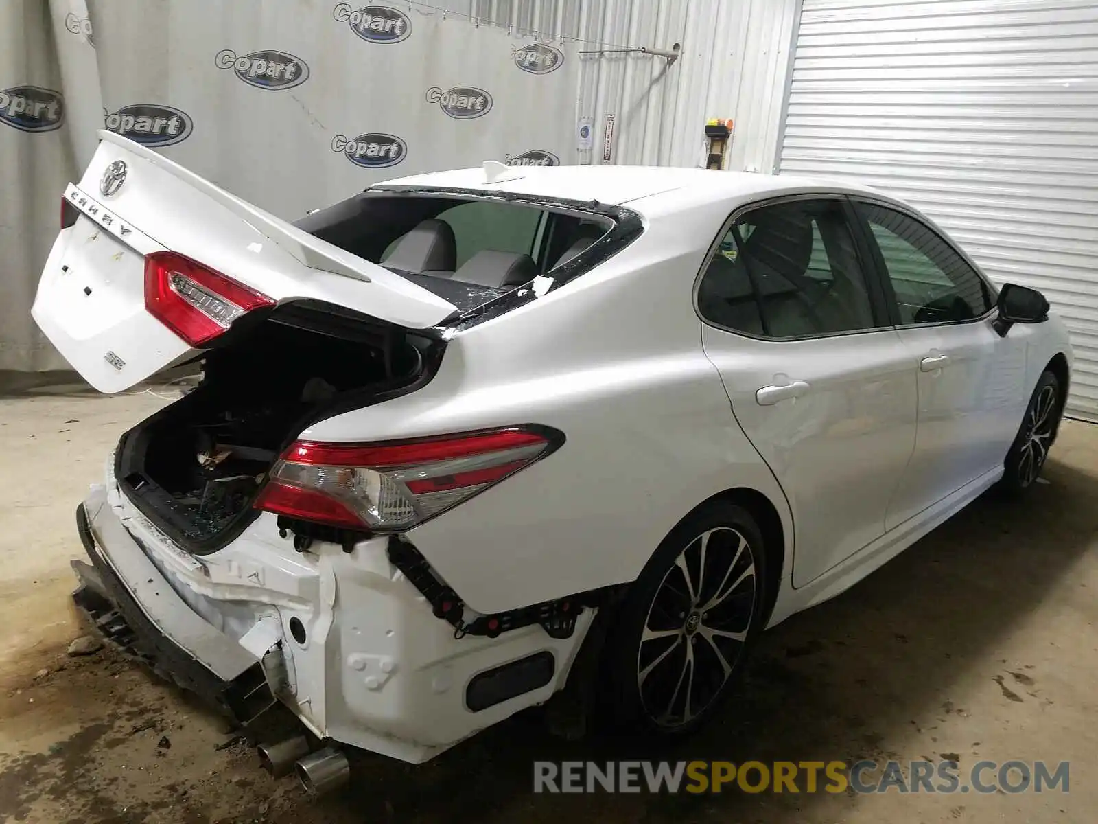 4 Photograph of a damaged car 4T1B11HK0KU283055 TOYOTA CAMRY 2019