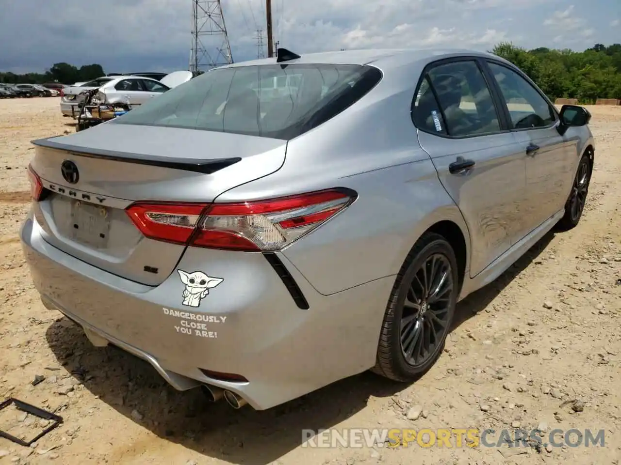 4 Photograph of a damaged car 4T1B11HK0KU293424 TOYOTA CAMRY 2019