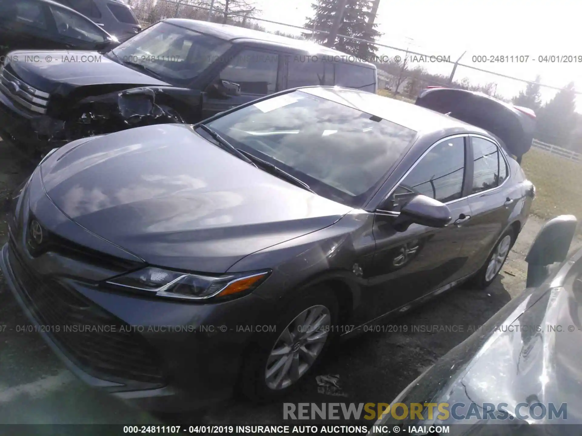 2 Photograph of a damaged car 4T1B11HK0KU682192 TOYOTA CAMRY 2019