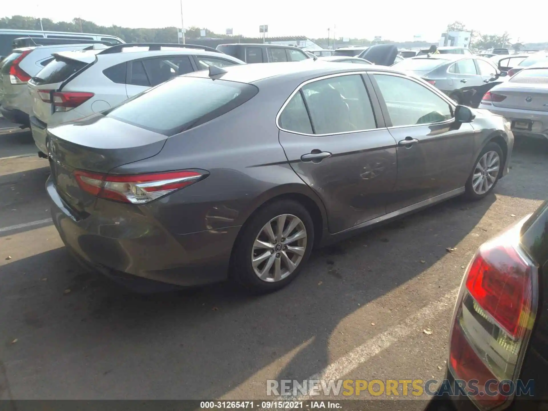 4 Photograph of a damaged car 4T1B11HK0KU686470 TOYOTA CAMRY 2019