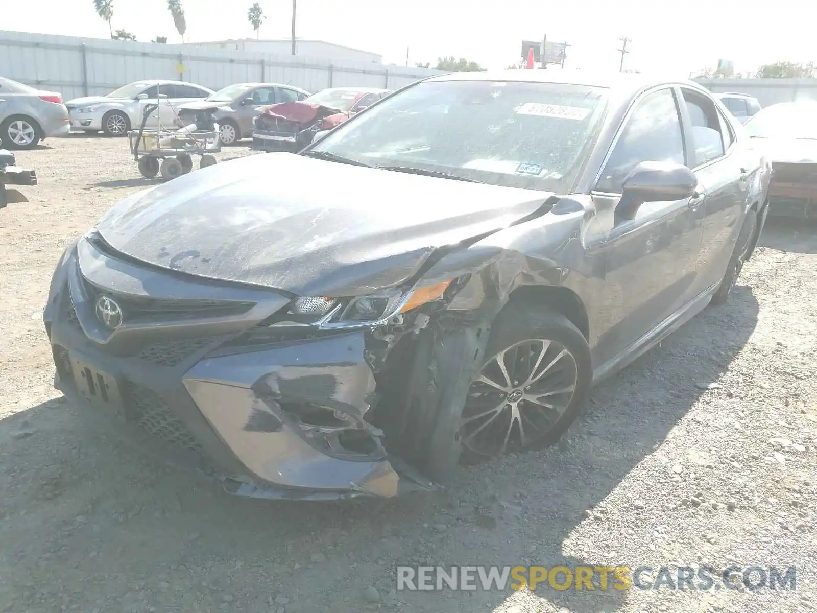 2 Photograph of a damaged car 4T1B11HK0KU686842 TOYOTA CAMRY 2019